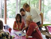 52.Denise Ron Steve Greg look at photos