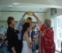 24. Raising the crown of the groom